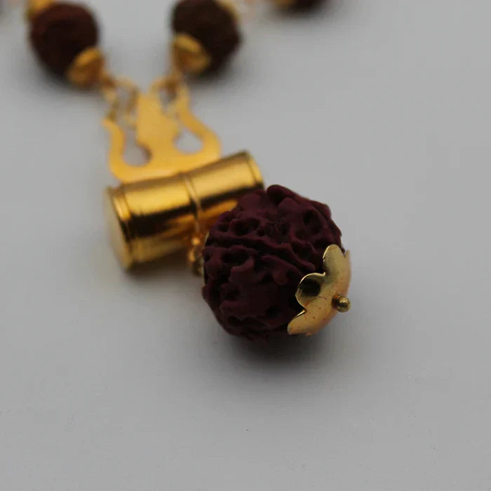 Mahakal Tabiz Damru Trishul Locket With Rudraksha Golden Cap Mala for Men and Women (Buy 1 Get 1 FREE)